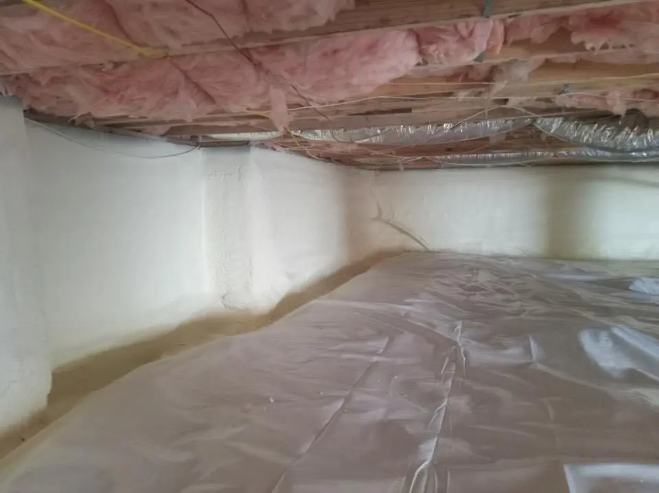 Crawl space encapsulation with closed-cell spray foam for Commercial Roof Restoration in Chamblee